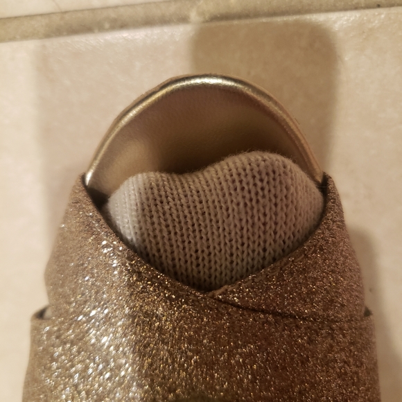 Gold shoe with light colored sock on per request - Picture 6 of 7